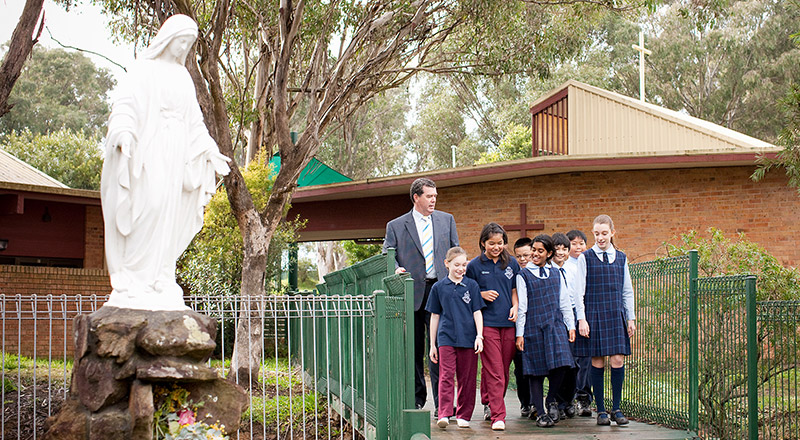 Previous students and principal at St John Vianney's Primary School Doonside
