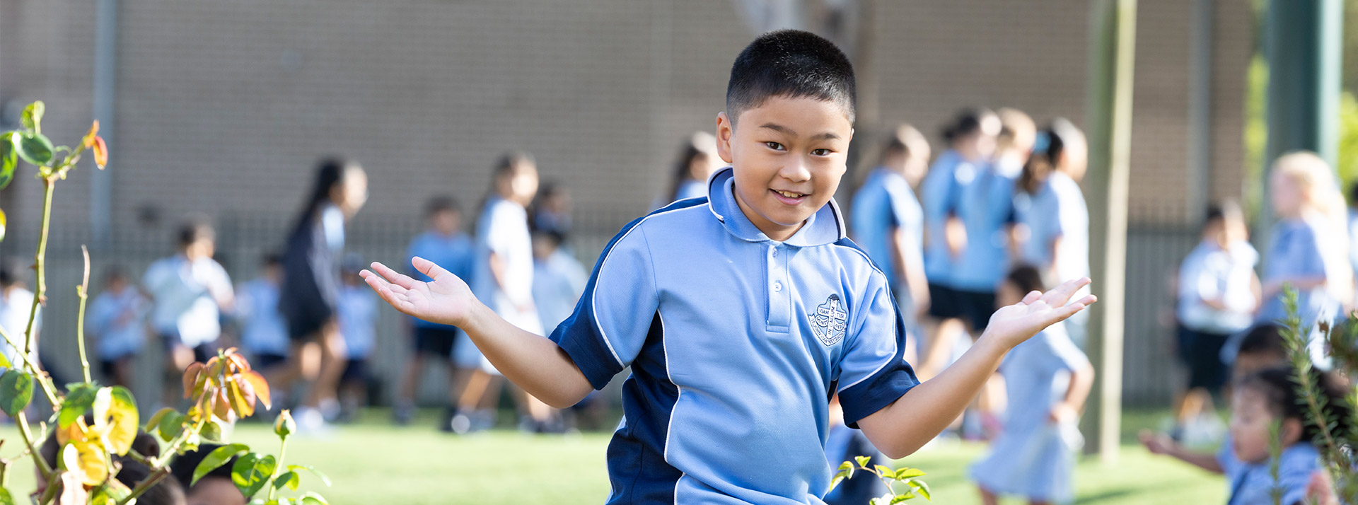 St John VIanney's Primary student shrugging his shoulders