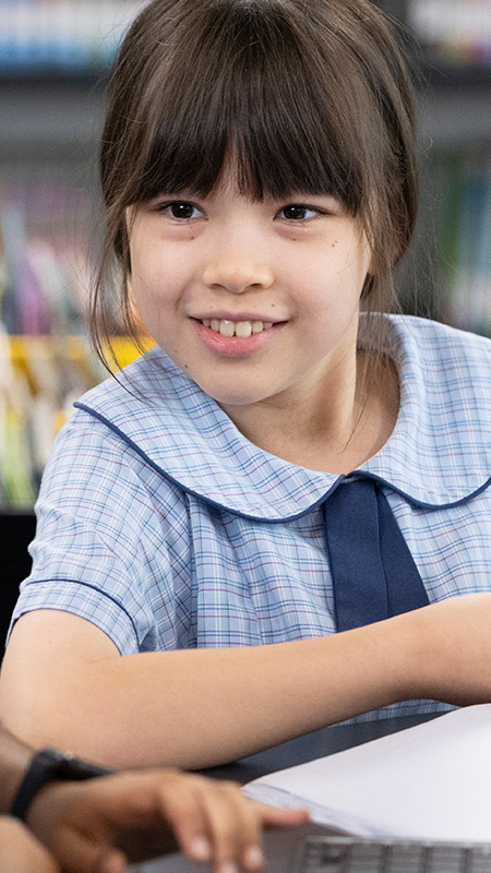 Student in class at St John Vianney's Primary Doonside