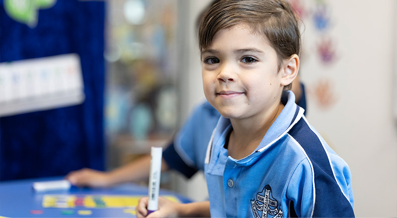 St John Vianney's Doonside Student working on maths
