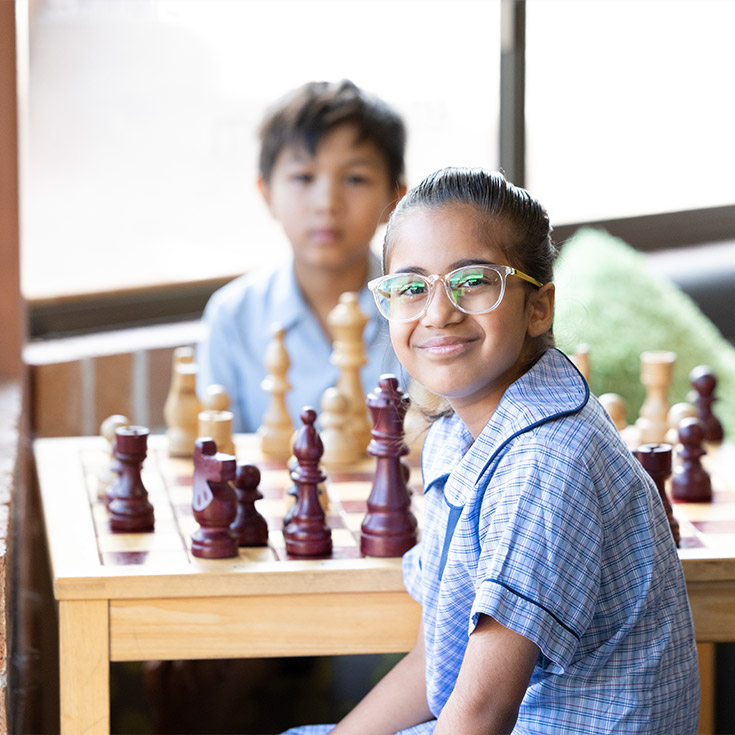 St John Vianney's Primary Doonside students playing chess