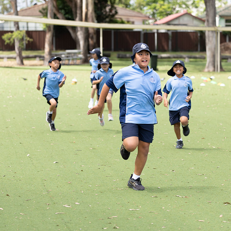 Students playing outdoors at St John Vianney's Doonside