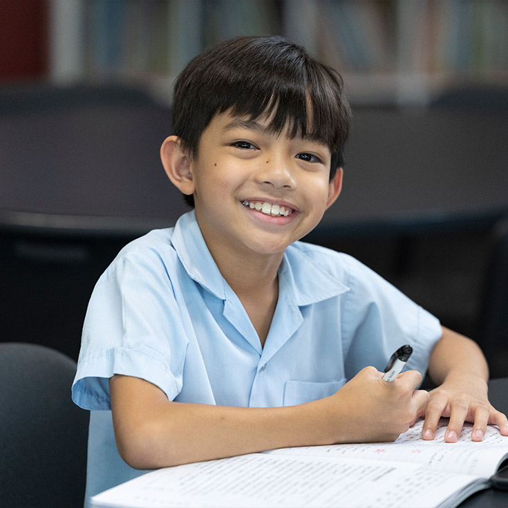 Student in class at St John Vianney's Primary Doonside