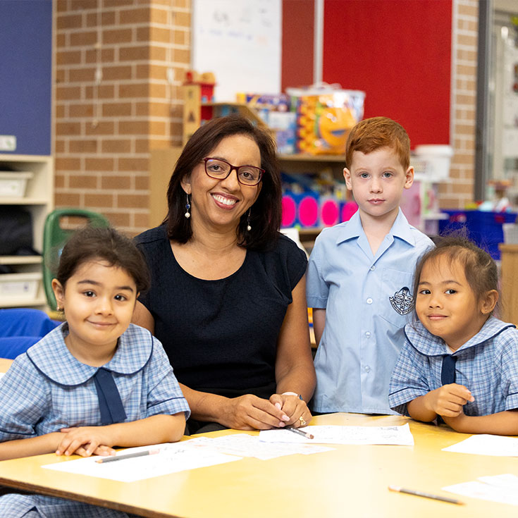 Jenny Godwin, Principal of St John Vianney's Primary, Doonside assisting students in class